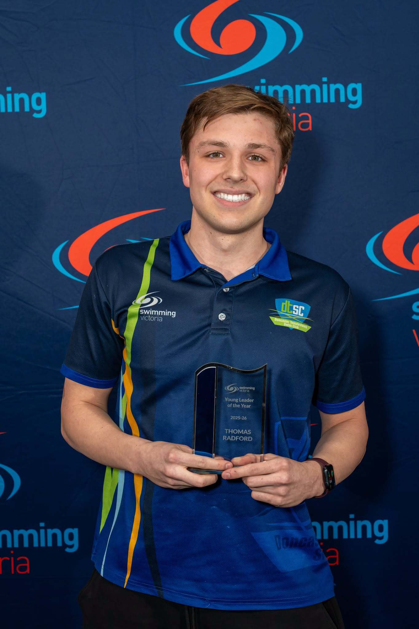 Thomas with his award.